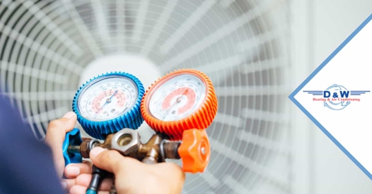 A man repairing an HVAC system